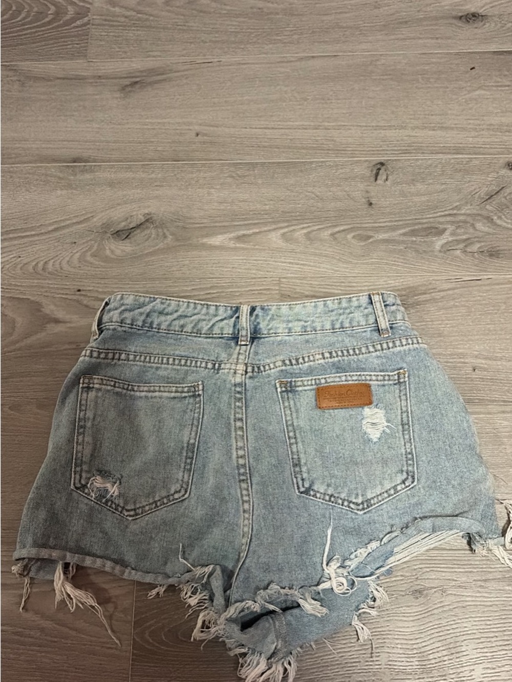 SHEIN Light Blue Distressed Denim Cutoff Shorts